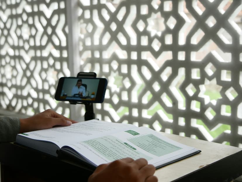 Student learning on mobile phone